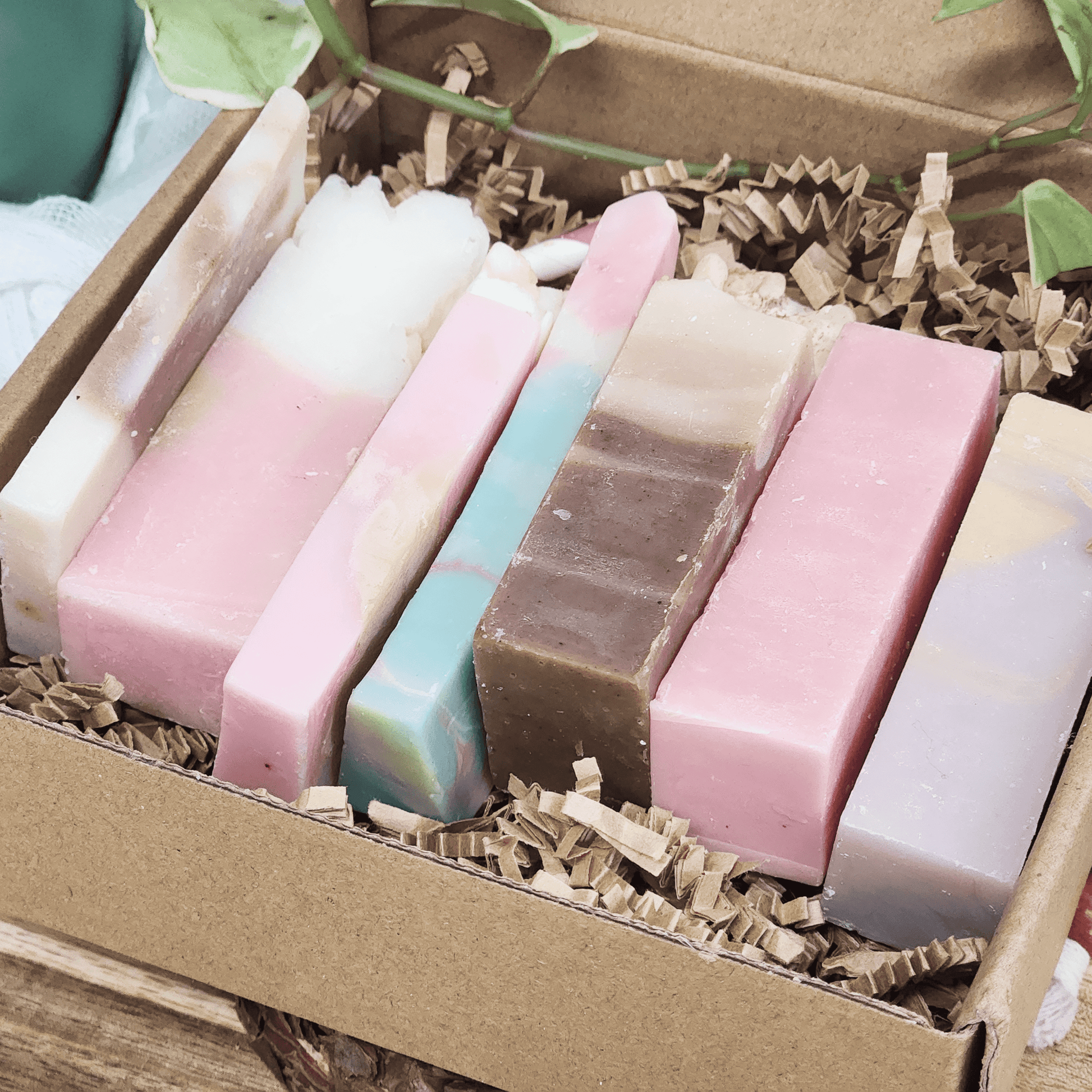 JOSSPURE handmade mystery soap sampler pack with assorted natural soap bars in a cardboard box